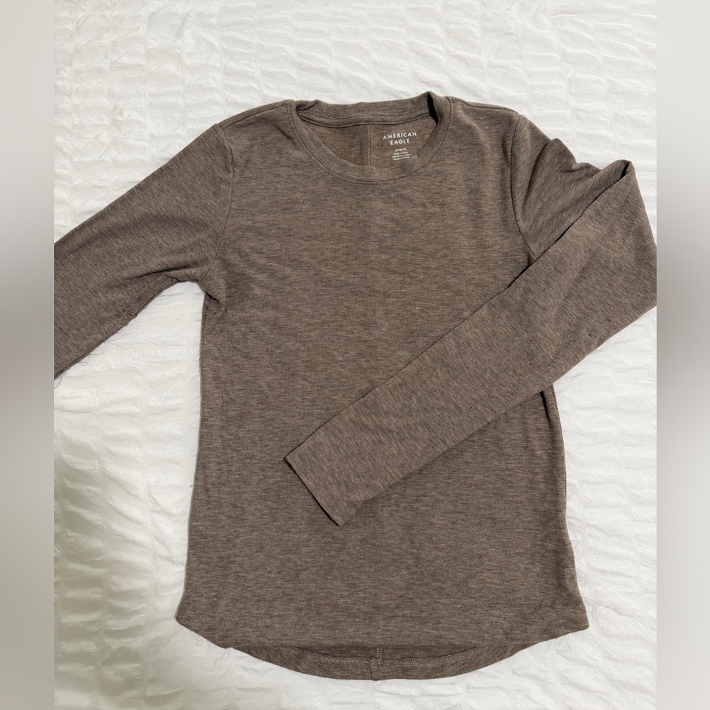 brown, long sleeve shirt from american eagle!! size M but is a tight fit.